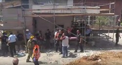 Najmanje 15 ljudi zarobljeno pod ruševinama zgrade u Tel Avivu